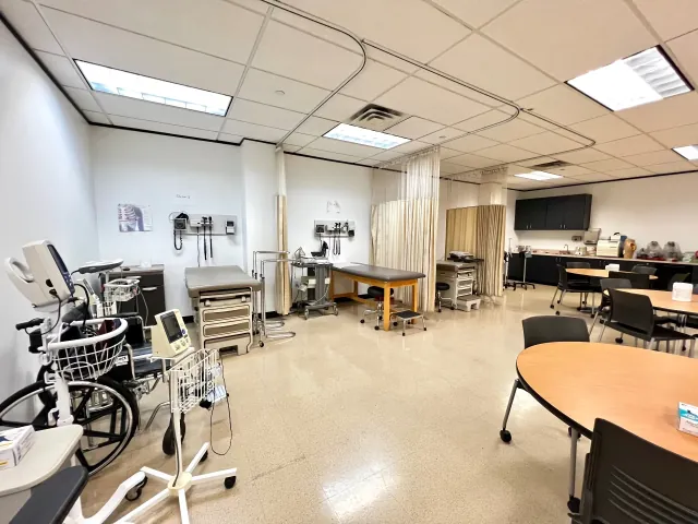 Clinical Training Lab at Houston Career Institute - Fully-equipped exam stations for hands-on patient care practice