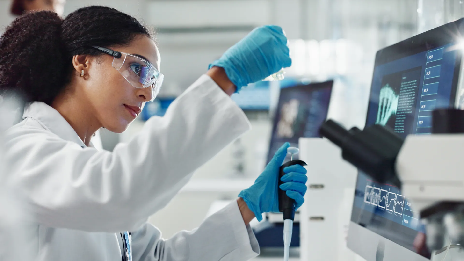 Lab assistant processing blood specimens